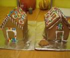 Γλυκό και όμορφο στολίδι Χριστούγεννα, δύο μελόψωμο σπίτια